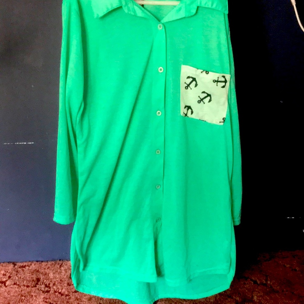 I am selling a teal colored shirt/flannel.